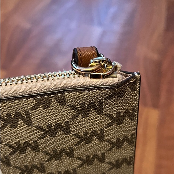 Like new Michael Kors Brown and Cream Monogram Clutch - Picture 7 of 16